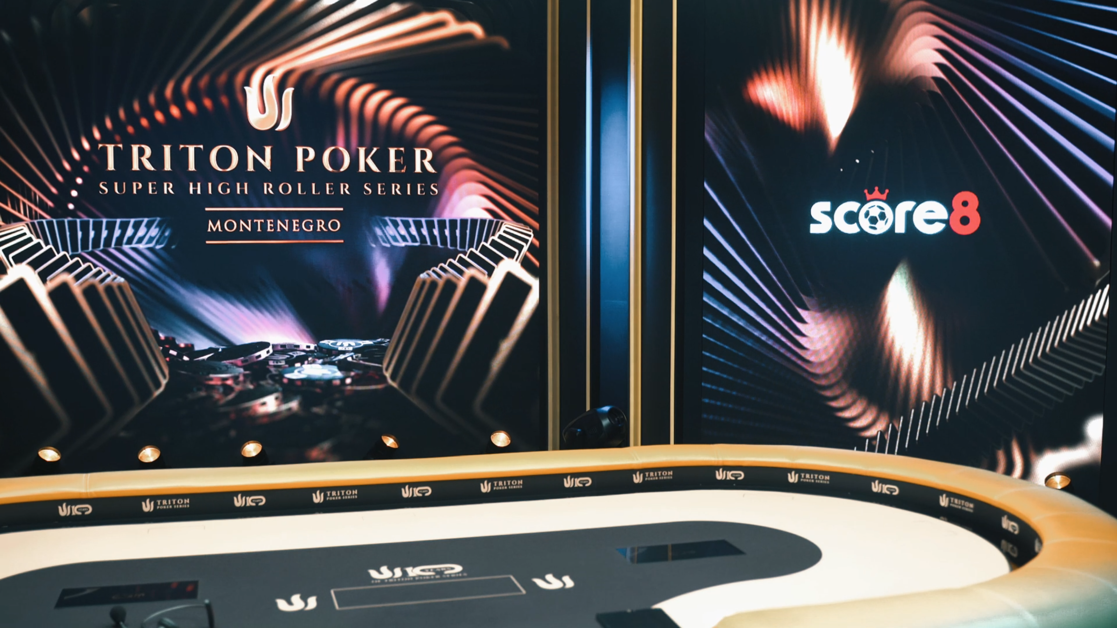 Score8 and Triton Poker Montenegro event branding on a premium stage